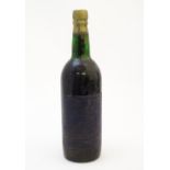 A bottle of 1863 Blandy's Malmsey Solera madeira, 70cl Please Note - we do not make reference to the