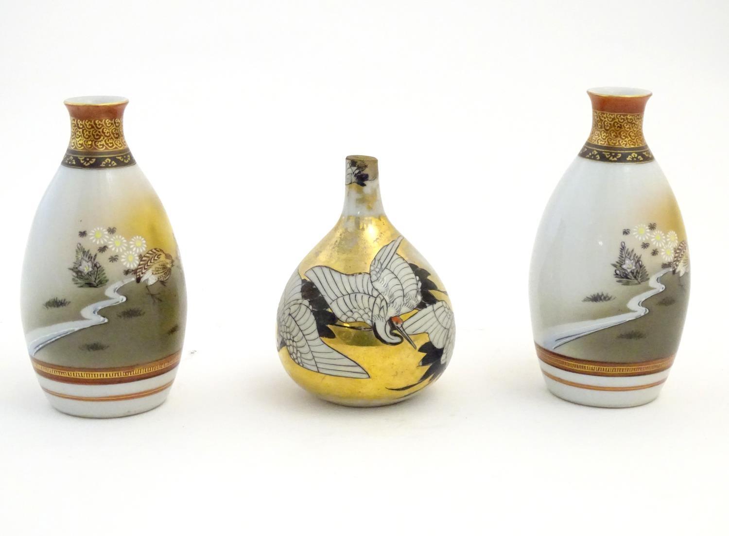 Three Japanese vases, comprising a pair decorated with a landscape scene with quail birds and - Image 6 of 11