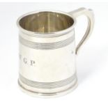 An Art Deco silver tankard with banded decoration. Hallmarked Birmingham 1929 maker A & J