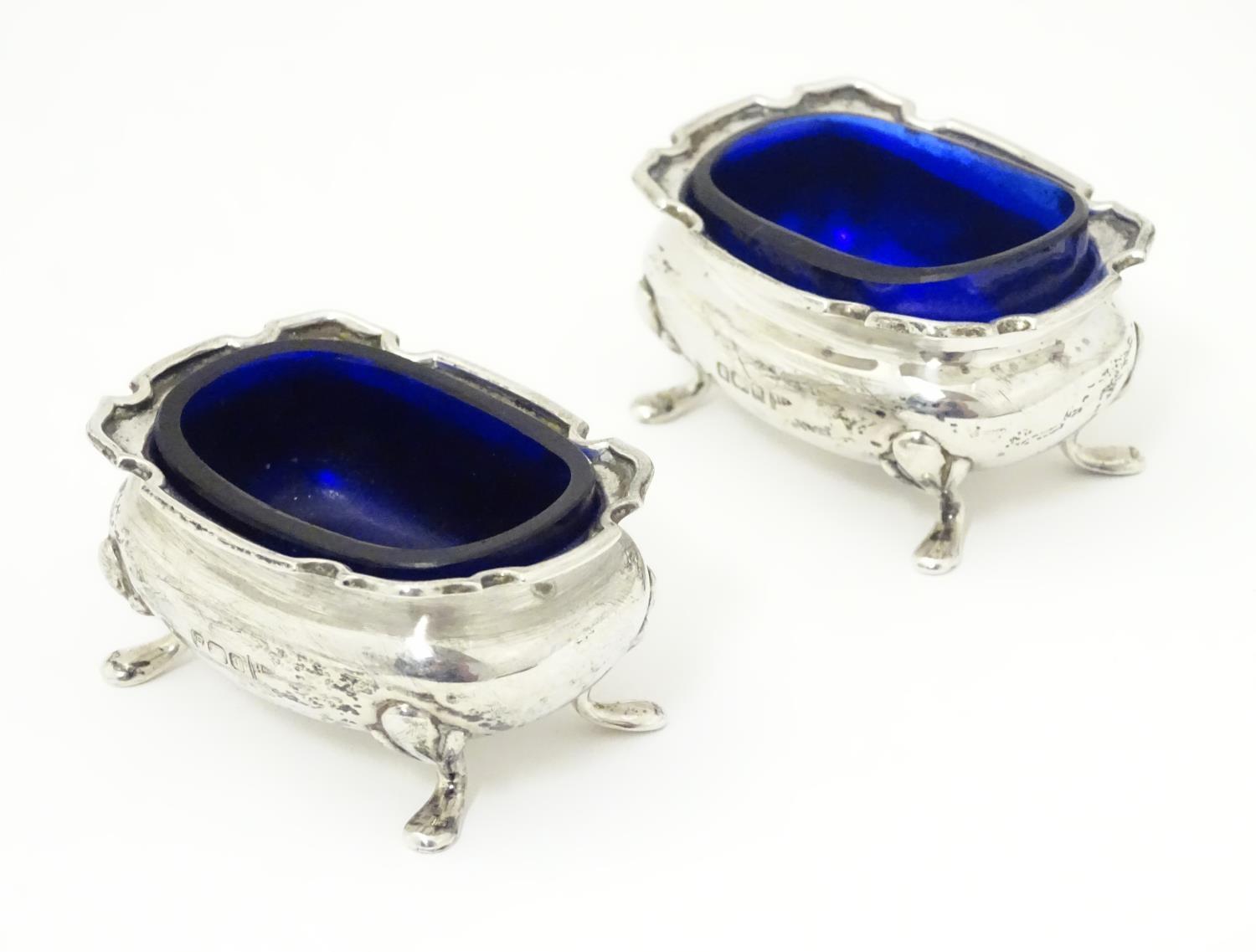 A pair of silver salts with blue glass liners, hallmarked Sheffield 1908 maker Walker & Hall. 2 1/2" - Image 3 of 7