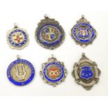 An assortment of early 20thC hallmarked silver fob medals, each obverse with enamelled insignia, the