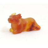 An Oriental carved agate / hardstone model of a recumbent buffalo. Approx. 1" high x 1 3/4" long