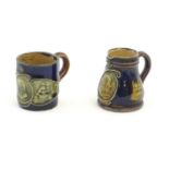 A Royal Doulton stoneware miniature jug and tankard commemorating Lord Nelson with a portrait of