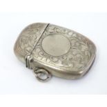 A silver vesta case with engraved decoration maker Birmingham 1907 maker William M Hayes. 1 3/4"