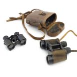 An early 20thC cased pair of binoculars / field glasses by Ross, London marked with serial number