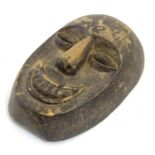 Ethnographic / Native / Tribal: A carved Himalayan mask. Approx. 11" long Please Note - we do not