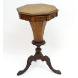 A mid / late 19thC trumpet shaped sewing table with an octagonal top above a canted stem and