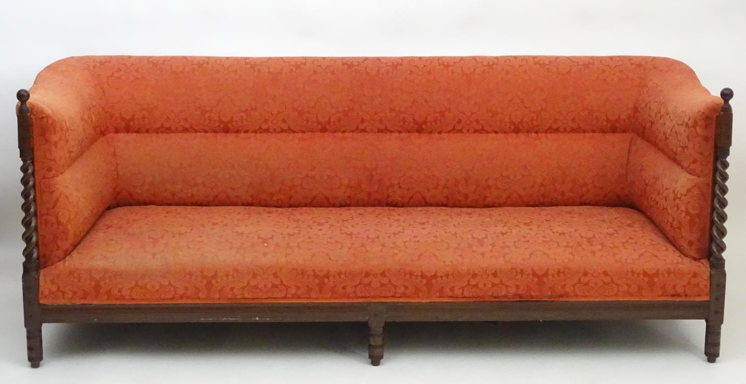 A late 19thC Arts & Crafts three seat sofa with turned barley twist pillars to the front with turned - Image 6 of 13