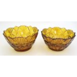 Two amber glass bowls with cut decoration. approx. 6" wide x 3 1/3" high (2) Please Note - we do not