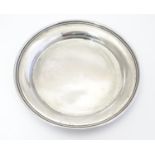 A silver pin tray / small dish of circular form, hallmarked Sheffield 1920 maker Harrison Brothers &