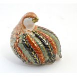 A Chinese model of a quail bird with gilt highlights. Marked under. Approx. 5 1/2" high Please