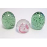 Three various glass paperweights. Largest 4 1/2" high (3) Please Note - we do not make reference