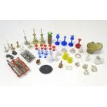 A quantity of dolls house items of miniature form, to include candlesticks with glass candles,