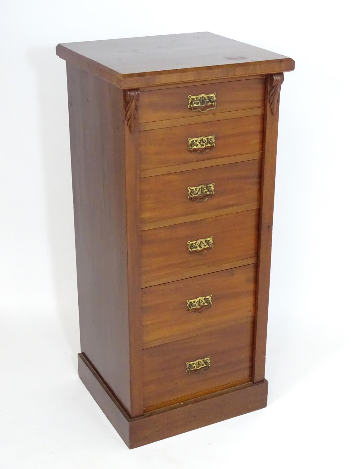 A late 19thC mahogany Wellington chest with a squared moulded top above six graduated drawers with