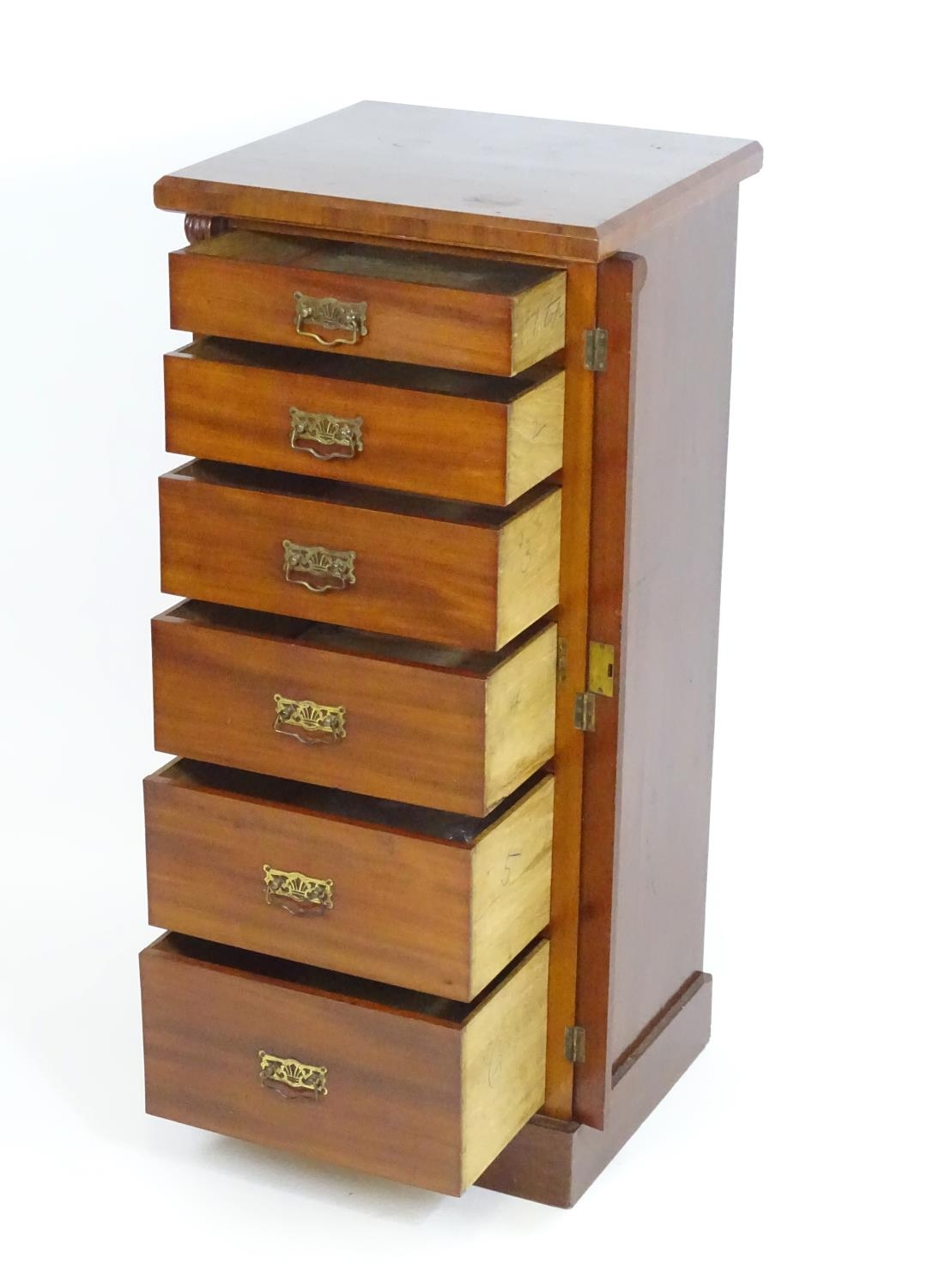 A late 19thC mahogany Wellington chest with a squared moulded top above six graduated drawers with - Image 5 of 7