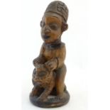 Ethnographic / Native / Tribal: A carved African figure with a leopard. Approx. 16" high Please Note