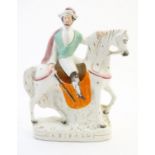 A Staffordshire pottery equestrian flat back depicting Garibaldi on horseback, titled to base.