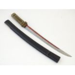 A Japanese Wakizashi sword with a bound tsuka handle, and a lacquered scabbard. Approx. 22" long