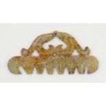 An Oriental soapstone carving with scrolling detail. Approx. 3 1/4" x 6 3/4" Please Note - we do not