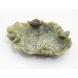 An Oriental carved soapstone brush washer formed as a stylised lotus leaf. Approx. 5" x 5 3/4"