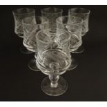 A set of 6 wine glasses with engraved decoration. Approx. 5 3/4" high Please Note - we do not make