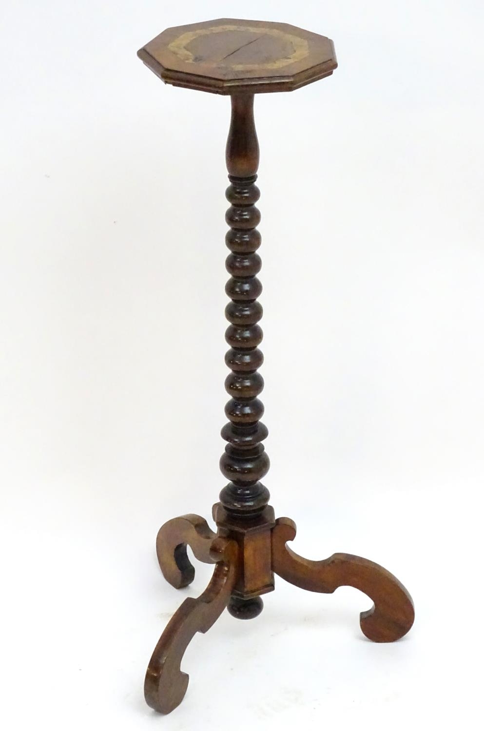 A 17thC and later walnut candle stand with a crossbanded top above a bobbin turned stem and three - Image 5 of 7