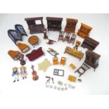 A large quantity of assorted dolls house furniture and household items, to include a tambour front