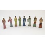 A set of eight Chinese ceramic figures modelled as the Eight Immortals with hand painted details.