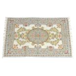 A 19thC hand embroidery / crewel work rug with floral and foliate decoration. Approx. 71" x 45"