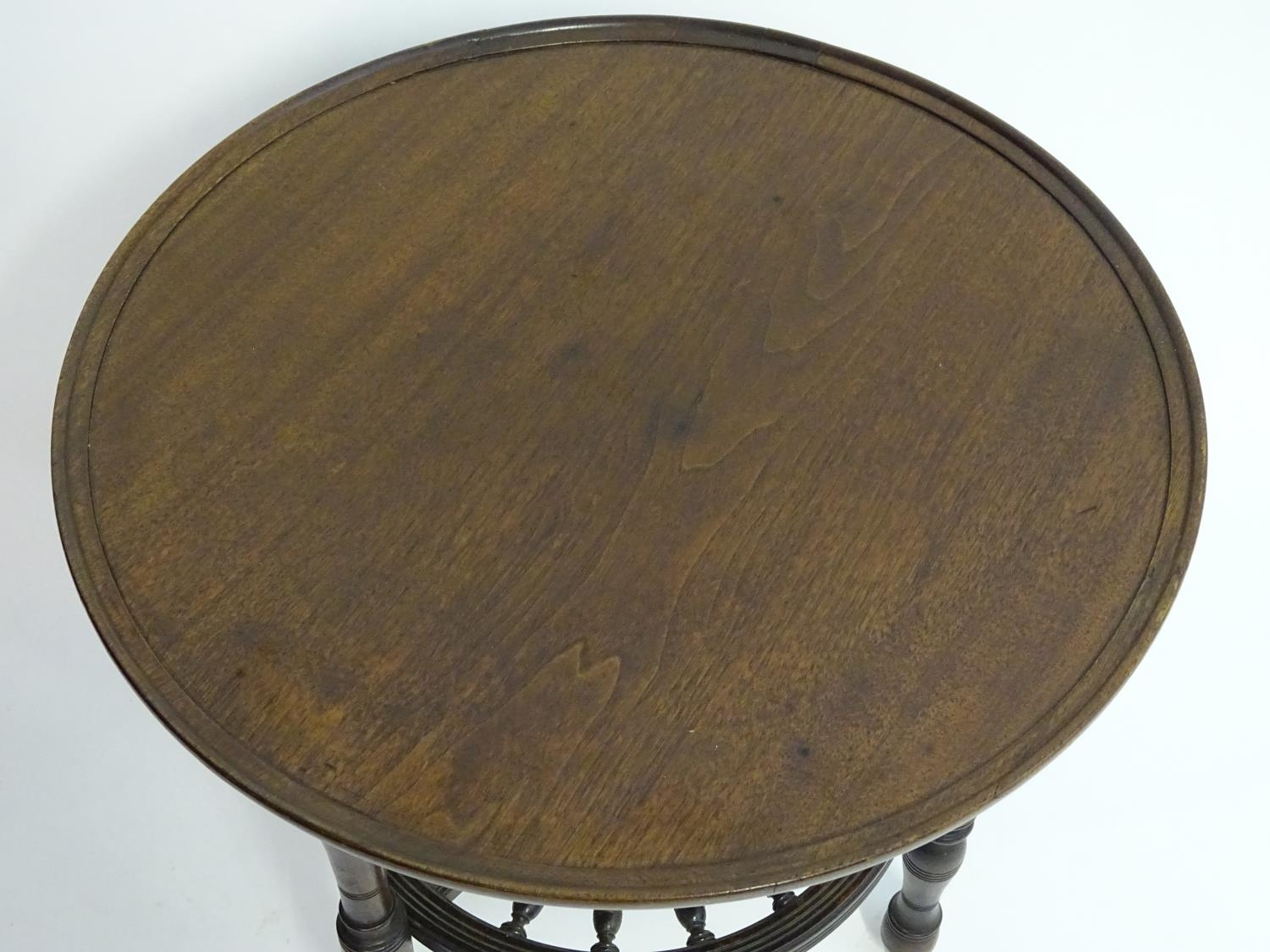 A late 19thC mahogany occasional table with a lazy Susan top and rounded under tier with turned - Image 5 of 8