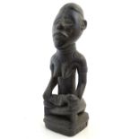 Ethnographic / Native / Tribal: A carved Congo figure of a woman and child. Approx. 19" high