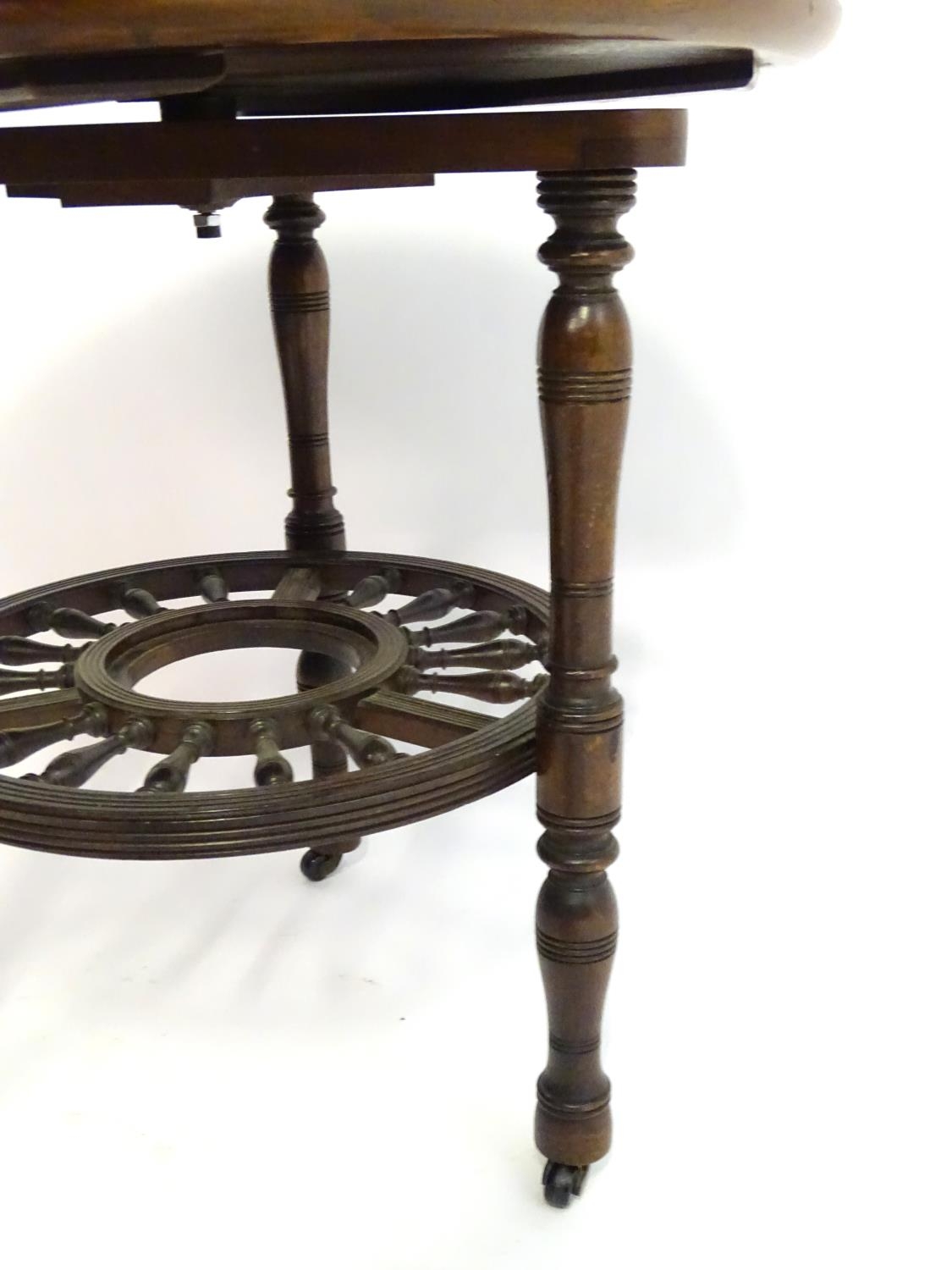 A late 19thC mahogany occasional table with a lazy Susan top and rounded under tier with turned - Image 7 of 8