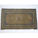 Rug / Carpet : An Oriental rug the beige ground with central medallion motif and geometric detail to