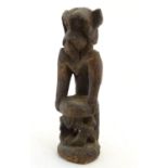 Ethnographic / Native / Tribal: A carved African figure modelled as a baboon. Approx. 14" high