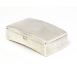 A silver hip formed snuff / pill box, hallmarked Birmingham 1903, maker Matthew Wilcox & Sons.