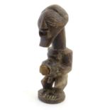 Ethnographic / Native / Tribal: A carved Songe figure. Approx. 9" high Please Note - we do not