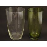 Two glass vases, one clear glass, the other green. The largest 9 3/4" high Please Note - we do not