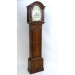 Anthony Marsh Clockmaker : An 18thC long case clock, the brass break arch dial signed to silvered