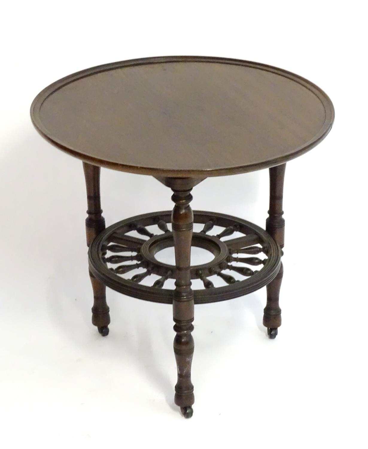 A late 19thC mahogany occasional table with a lazy Susan top and rounded under tier with turned - Image 3 of 8