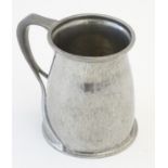 An Art Nouveau Liberty & Co. Tudric pewter tankard. Marked under, no. 066. Approx. 4 1/4" high