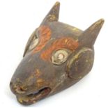 Ethnographic / Native / Tribal: An Indian mask of animal form with polychrome detail. Approx. 9"