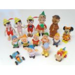 Toys: A quantity of assorted Disney toys to include the Seven Dwarfs, various Pinocchio toys, and