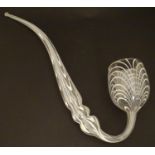 A large Nailsea glass pipe of clear glass with white detail. Approx 16" long Please Note - we do not