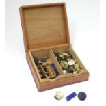 Militaria: a leather and sandalwood box containing an assortment of RAF / Royal Air Force tunic