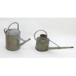 Garden & Architectural, Salvage: two mid 20thC galvanised steel watering cans, the largest marked '