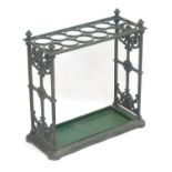 A Victorian Coalbrookdale cast iron stick stand, with provision for twelve canes / umbrellas /
