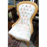 A spoon back chair with button upholstery. Approx. 38 1/2" tall Please Note - we do not make