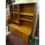 A late 20thC teak G plan dresser with glazed section Please Note - we do not make reference to the