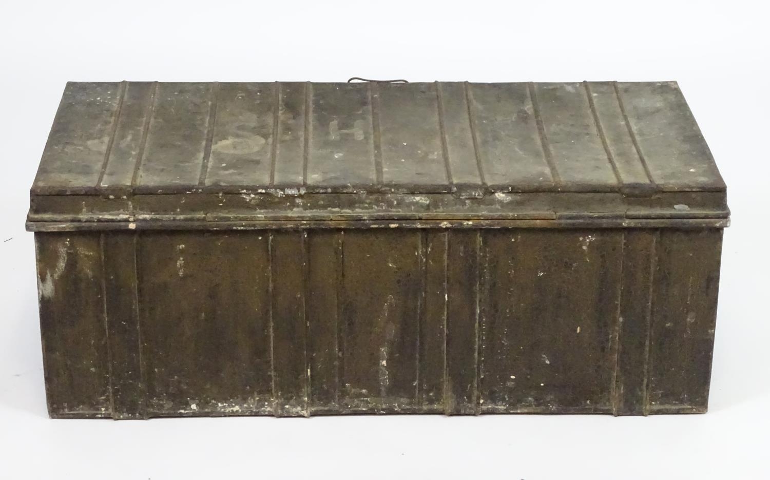 Two late 19thC tin trunks with lifting lids and flanked by carrying handles. The largest measuring - Image 2 of 11