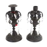 A pair of bronze and glass droplet candlesticks lustres Please Note - we do not make reference to